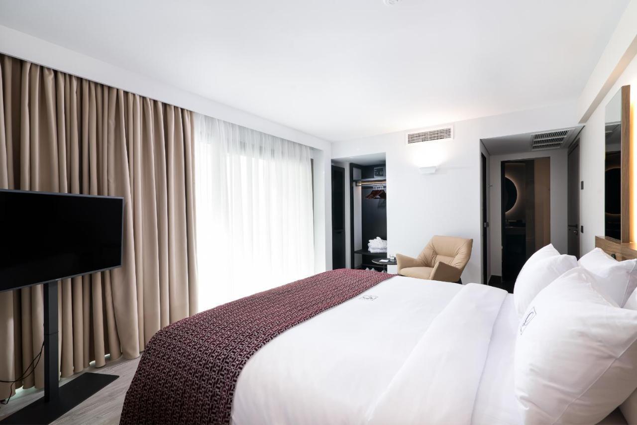 S Hotel Boutique Szaloniki Kültér fotó A bedroom at the hotel